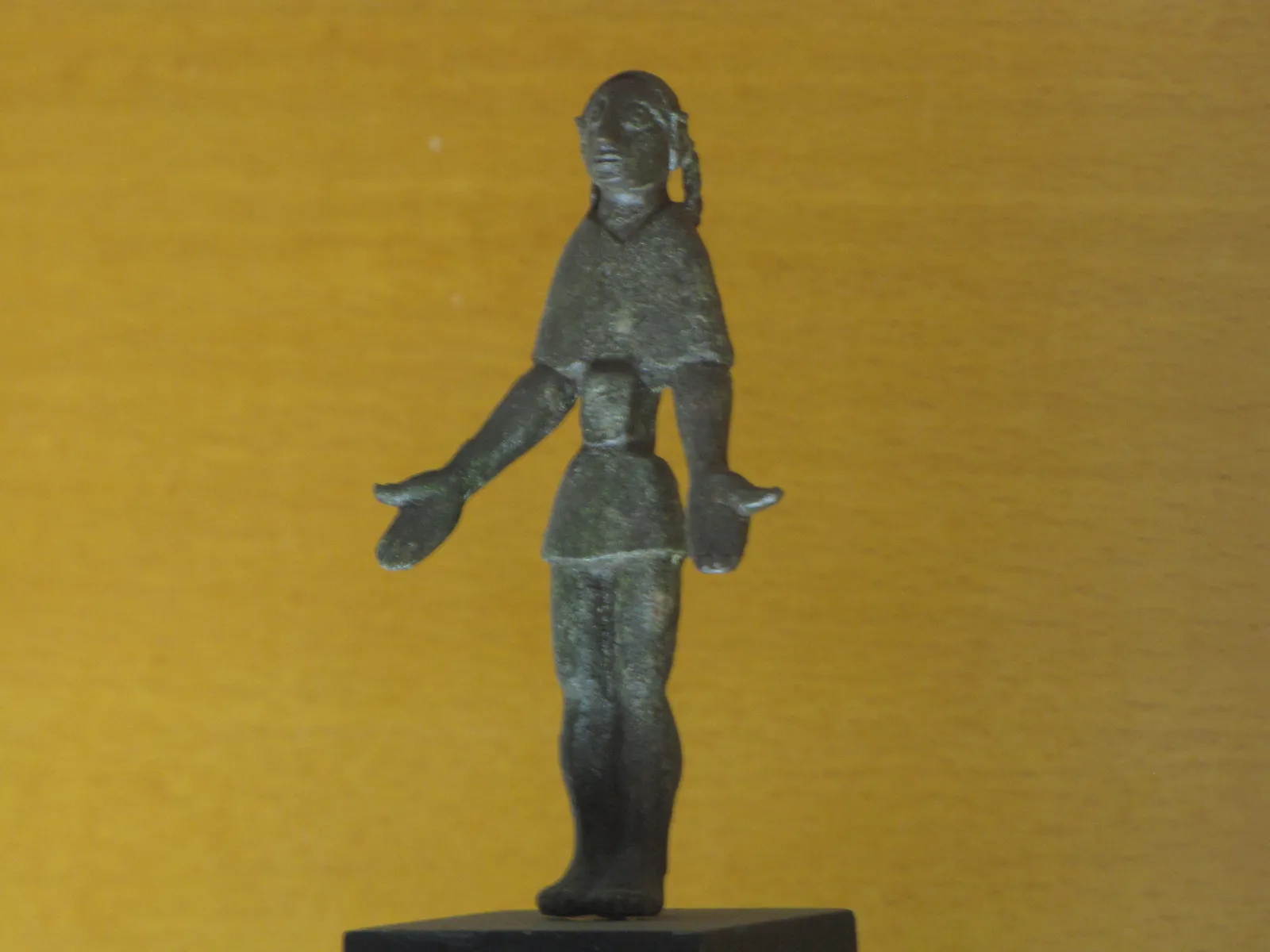 Bronze Female Figurine with Outstretched Arms