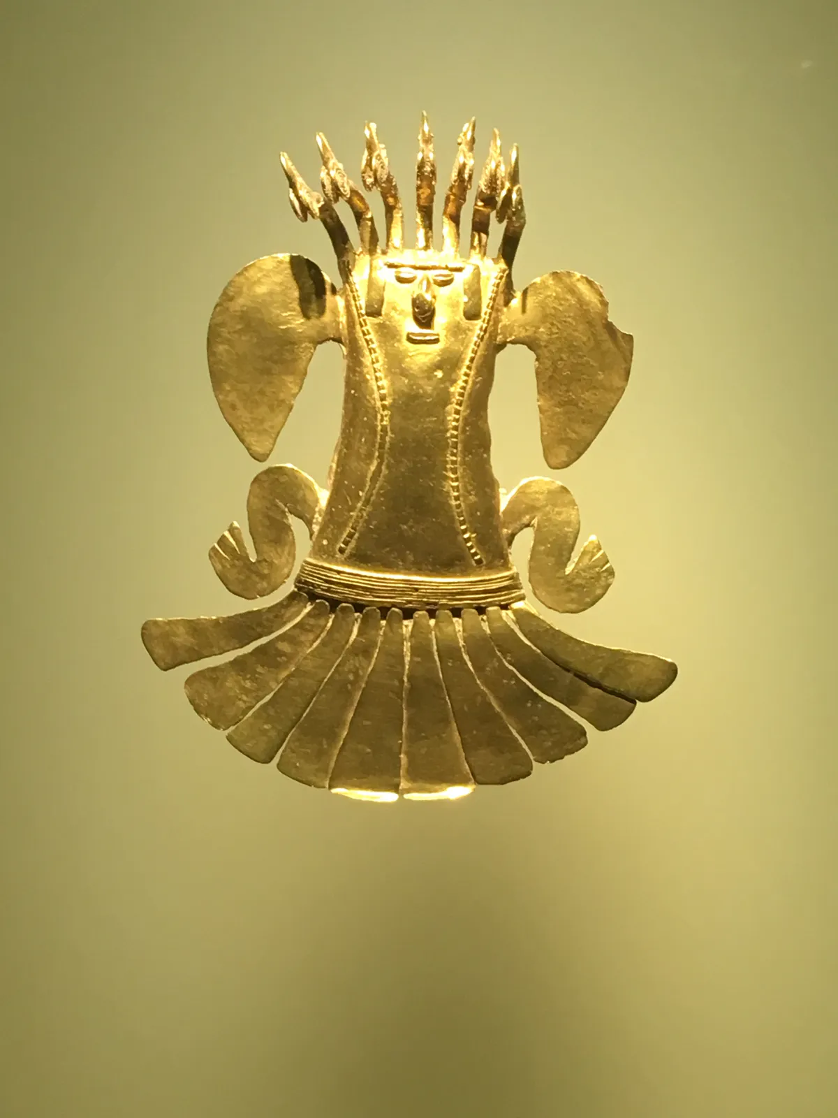 Figure Pendant with Radiant Headdress