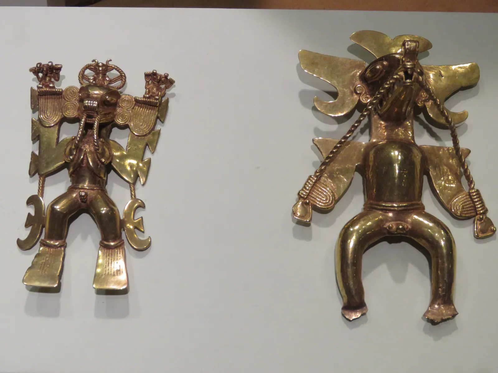 Diquís Shaman and Lizard-Masked Pendants