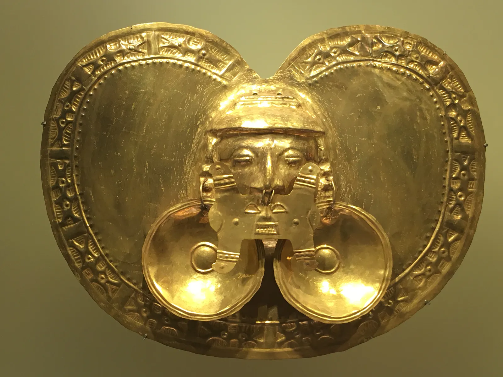 Ceremonial Pectoral with Face and Earspools