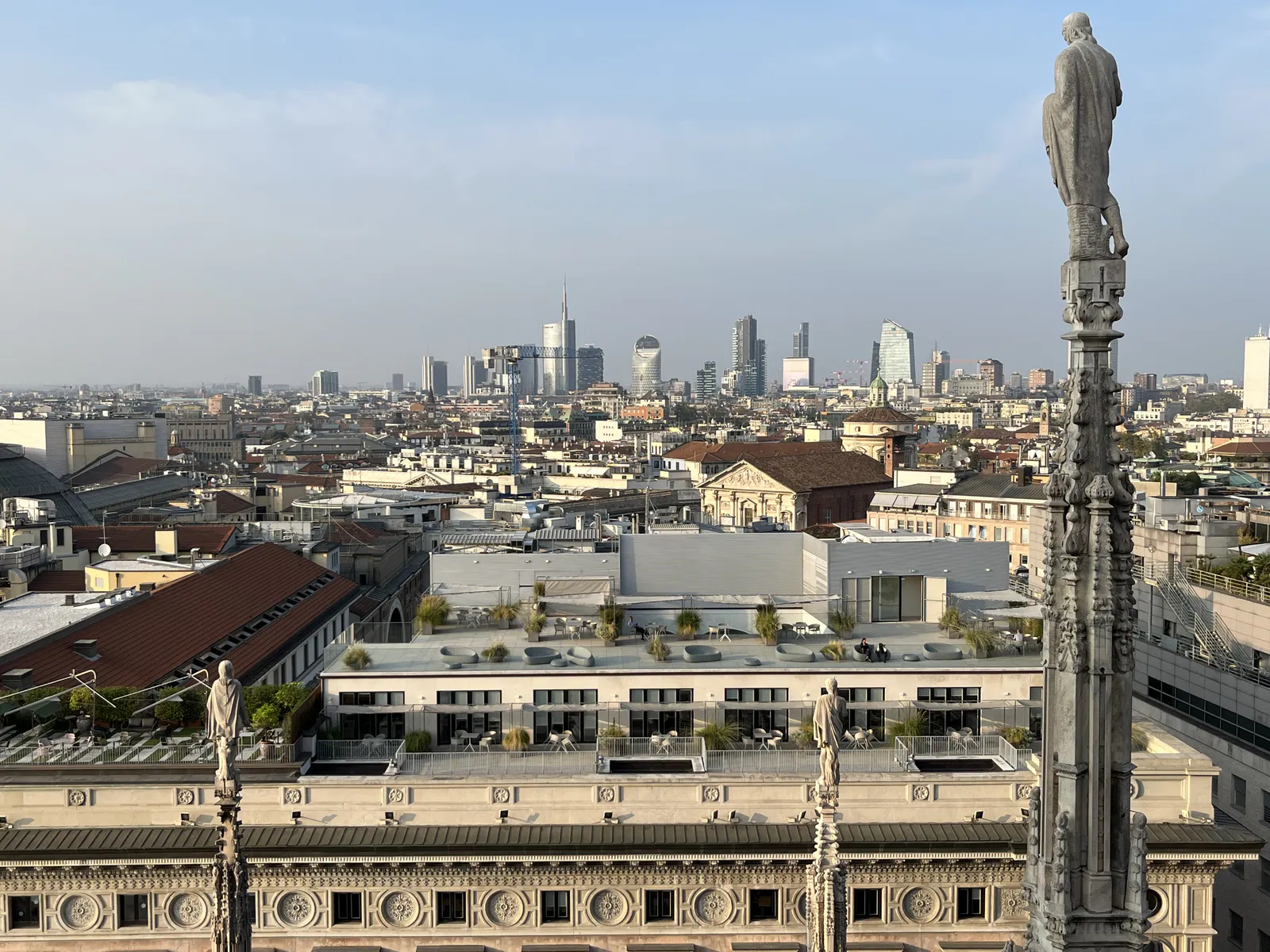 Gothic Pinnacle of the Duomo and Urban Horizon